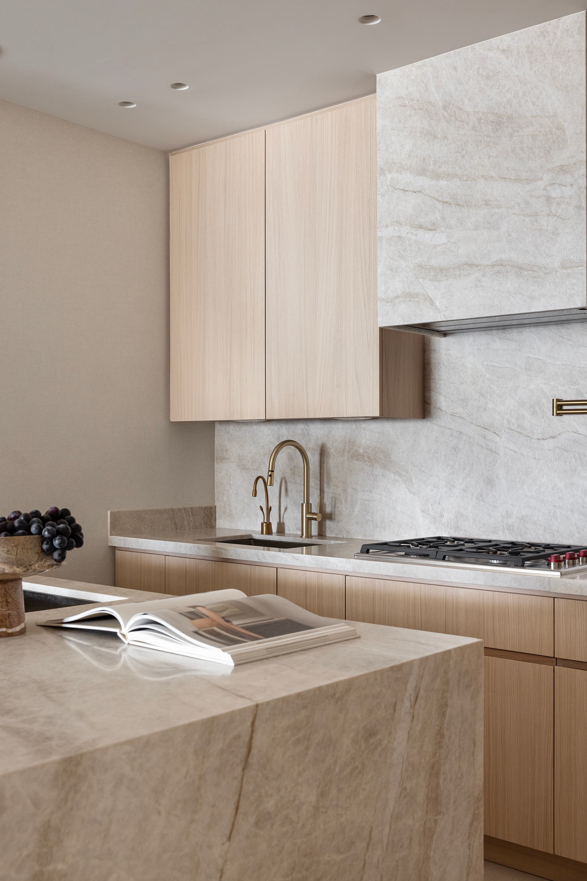 Kitchen marble counter and brass faucet detail